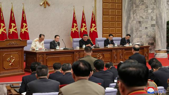 KCNA image of North Korean leader Kim Jong Un at a plenary meeting of the Workers' Party in Pyongyang