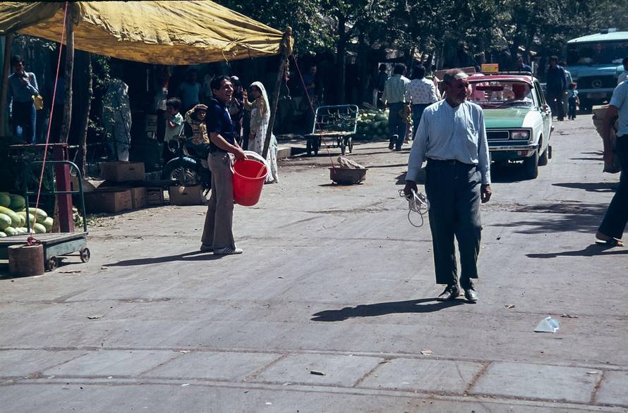 The image is of Shiraz, the 5th most populated city in Iran as it was in 1978 seen here in the souk, suq, market place. Shiraz is seen as a cultural city famed for its rose gardens, the home of the Persian Poet Saadi and the original source of the Shiraz 