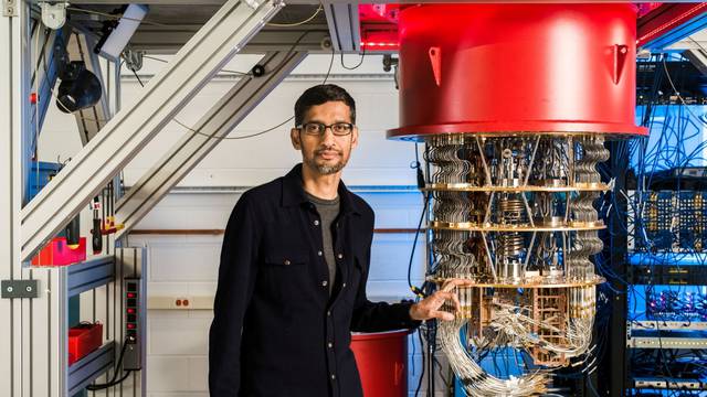 A handout picture shows Sundar Pichai with one of Google's Quantum Computers in the Santa Barbara lab