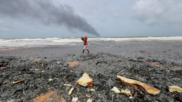 Smoke rises from a fire onboard the MV X-Press Pearl container in the seas off the Colombo Harbour in Ja-Ela