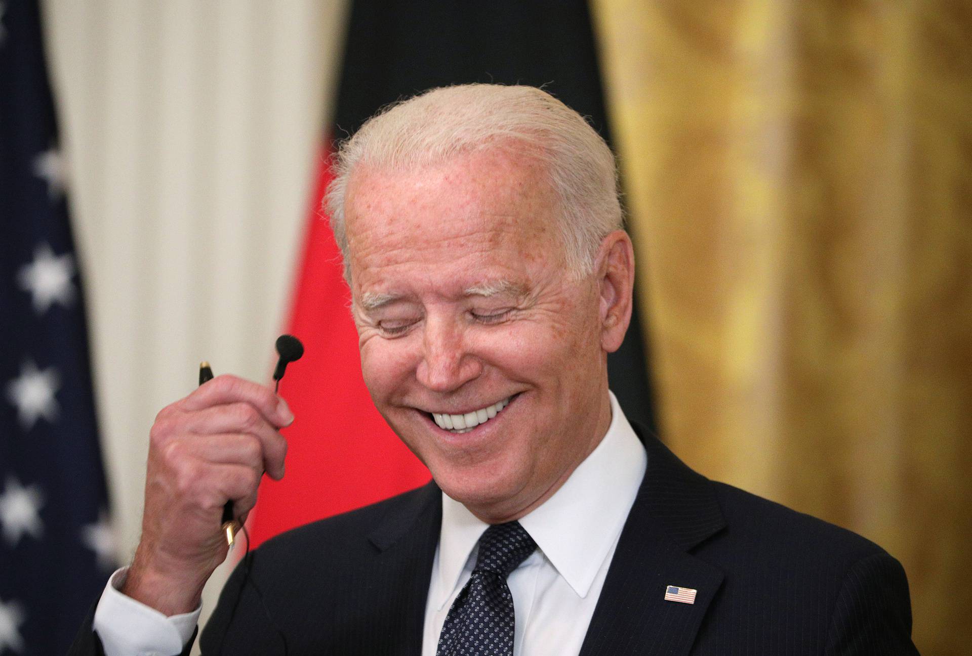 U.S. President Joe Biden and German Chancellor Angela Merkel attend a joint news conference in the East Room at the White House