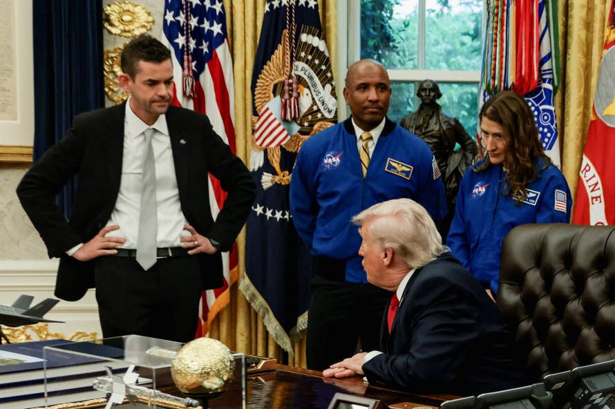 U.S. President Donald Trump meets Artemis II astronauts in the Oval Office at the White House in Washington
