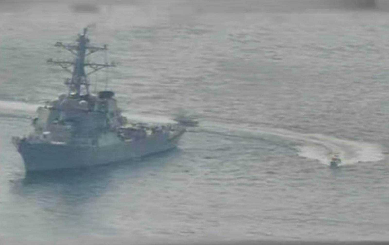 Iranian Islamic Revolutionary Guard Corps Navy vessel alongside U.S. Naval Forces in the Gulf