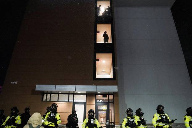 Protest outside the hotel where Bovino, who has been removed from his role, is reportedly staying, in Maple Grove