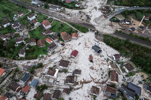 A drone view shows debris following a landslide at a flooded residential area in Donja Jablanica