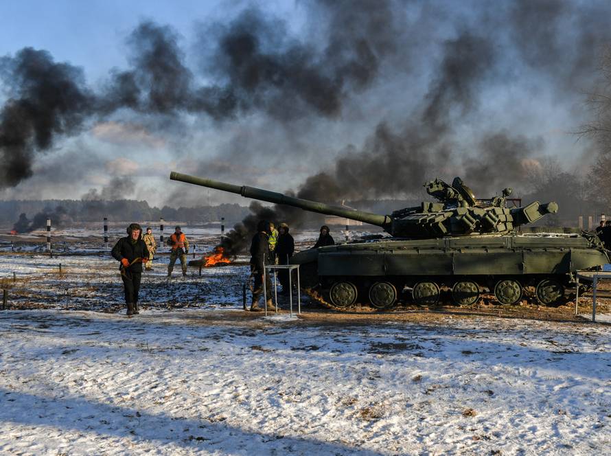 Ukrainian servicemen take part in drills as President Poroshenko visits a military training centre in Chernihiv Region