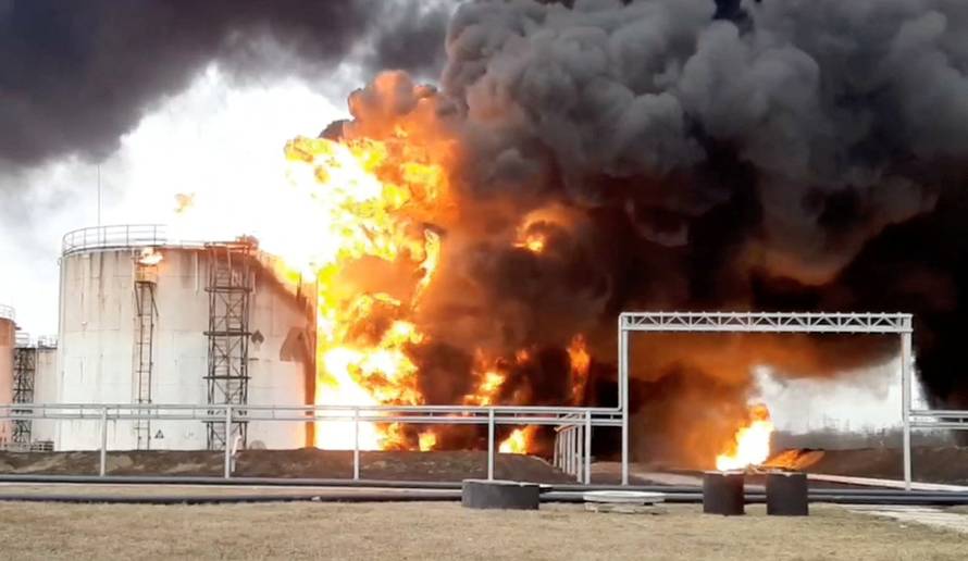 A still image shows a fuel depot on fire in Belgorod