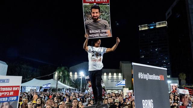 People demand the immediate release of hostages held in Gaza by Hamas, in Tel Aviv