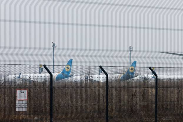 Parked planes are seen at Kyiv Airport after Russian President Vladimir Putin authorized a military operation in eastern Ukraine
