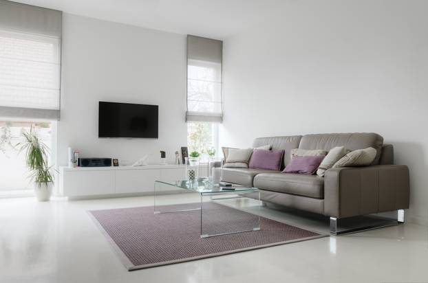 White,Living,Room,With,Taupe,Leather,Sofa,And,Glass,Table