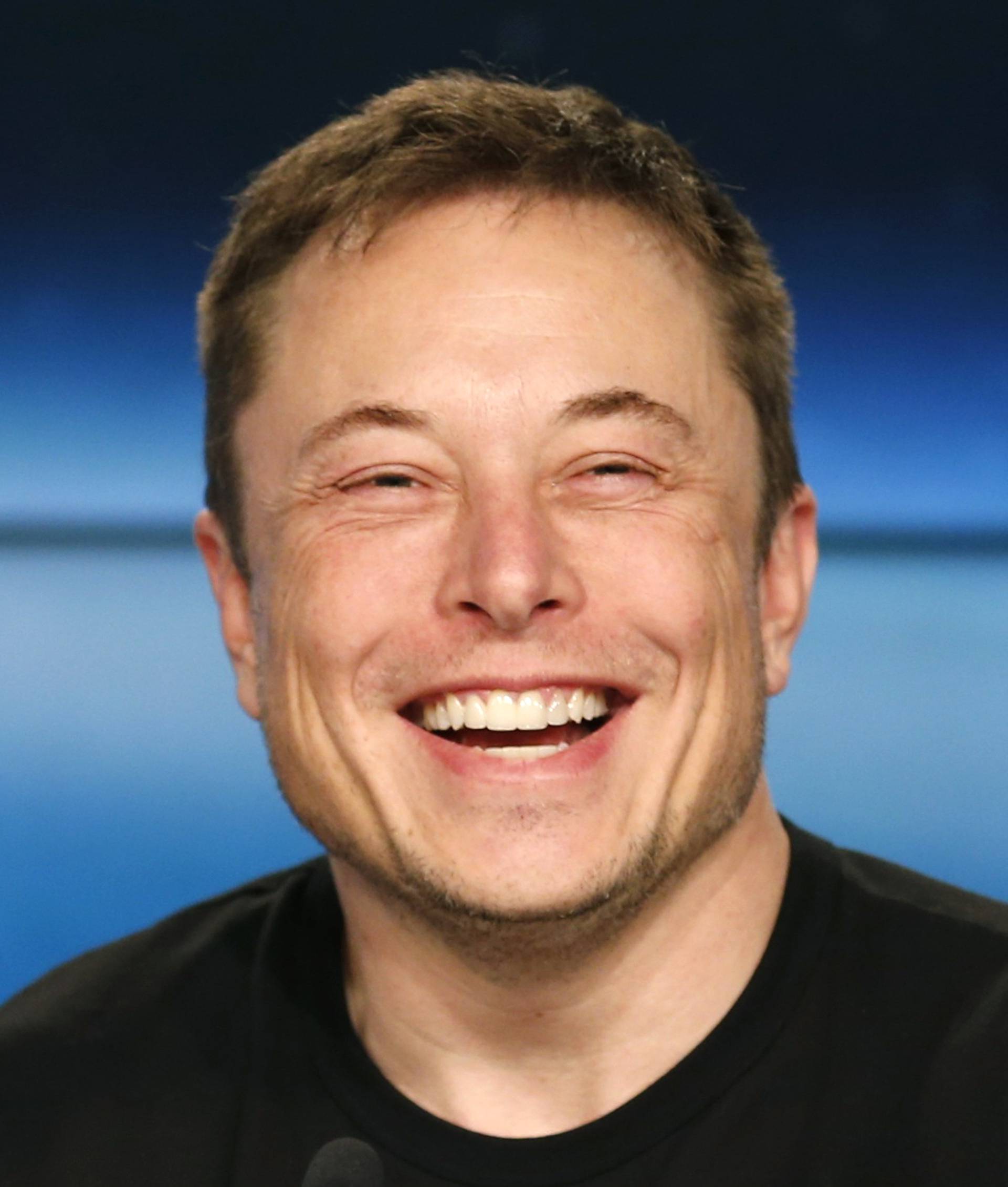 SpaceX founder Musk smiles at a press conference following the first launch of a SpaceX Falcon Heavy rocket in Cape Canaveral