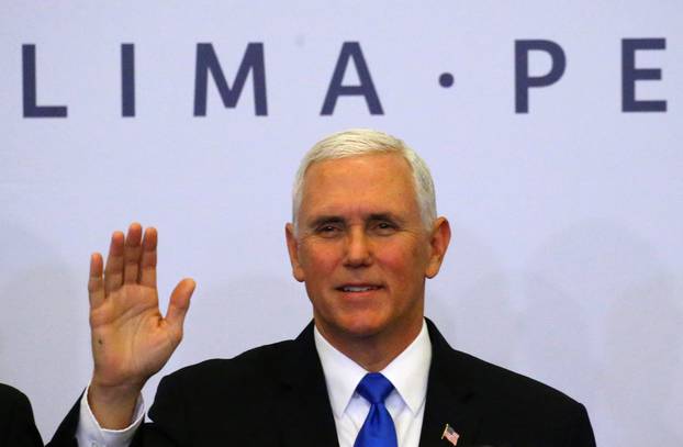 U.S. Vice President Mike Pence poses at the family photo of the VIII Summit of the Americas in Lima