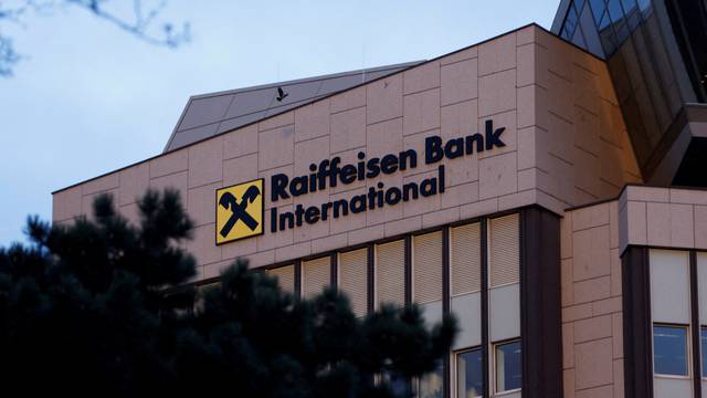 FILE PHOTO: The logo of Raiffeisen Bank International is seen on their headquarters in Vienna