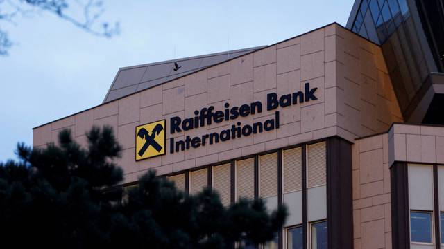 FILE PHOTO: The logo of Raiffeisen Bank International is seen on their headquarters in Vienna