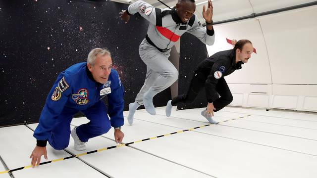 Retired sprinter Usain Bolt, French astronaut Jean-Francois Clervoy and French Interior designer Octave de Gaulle enjoy zero gravity conditions during a flight in a specially modified plane above Reims