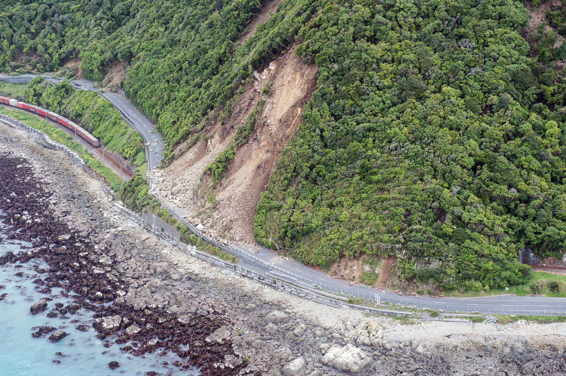 Landslides block State Highway One near Kaikoura on the upper east coast of New Zealand's South Island following an earthquake