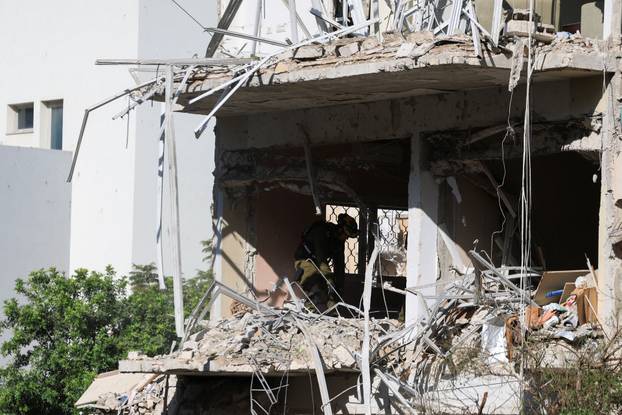 Aftermath of Iranian missile barrages in central Israel