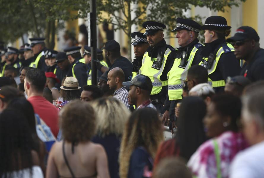 Police keep watch at the Notting Hill Carnival in London