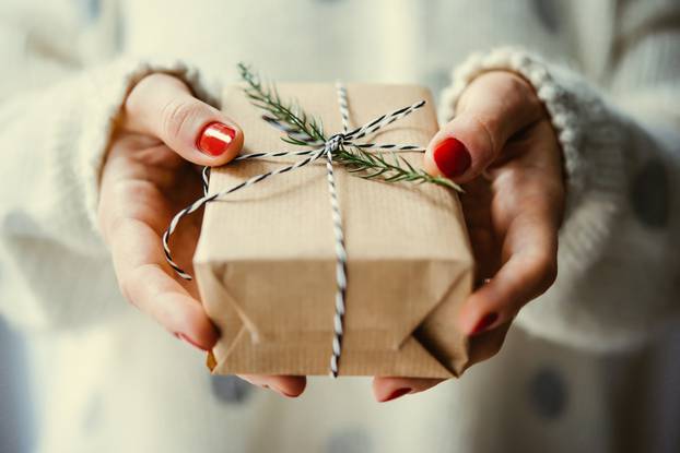 Woman's,Hands,Hold,Christmas,Or,New,Year,Decorated,Gift,Box.