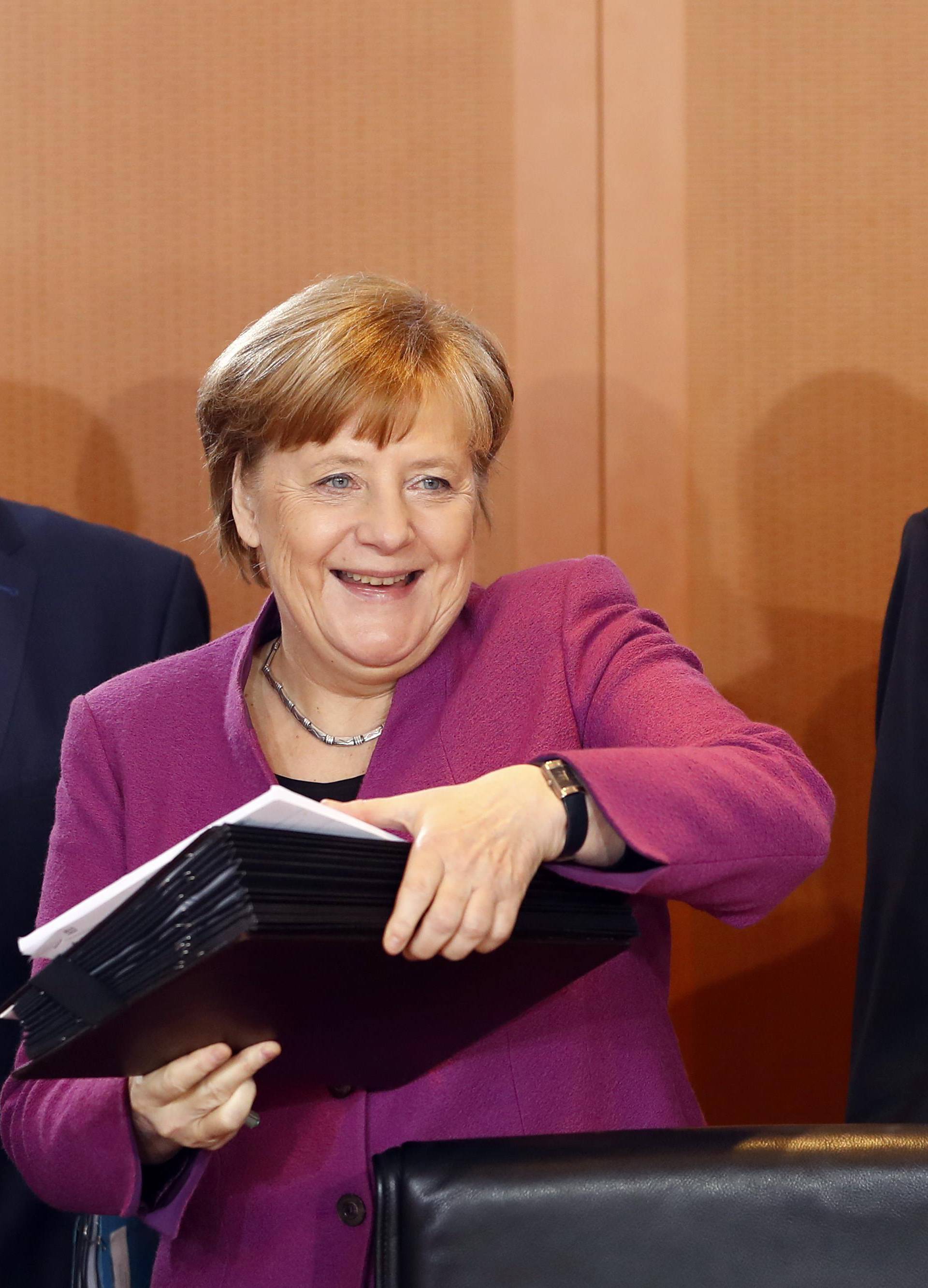 German Foreign Minister Sigmar Gabriel, Chancellor Angela Merkel and Chancellery minister Peter Altmaier attend the weekly cabinet meeting at the Chancellery in Berlin