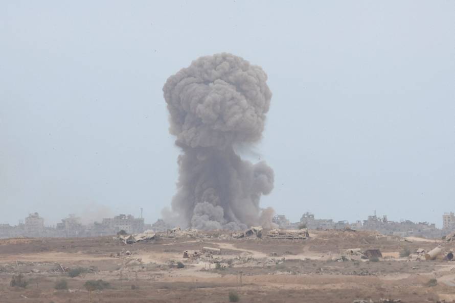 Smoke rises from Gaza as seen from the Israeli side of the border