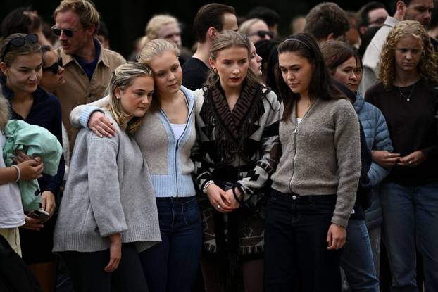 People gather outside the Royal Palace, following the death of Norway's King Harald, in Oslo