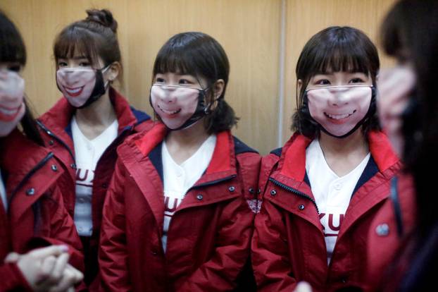 Cheerleaders wearing face masks due to the outbreak of the coronavirus disease (COVID-19) are seen at the first professional baseball league game of the season at Taoyuan International baseball stadium in Taoyuan city