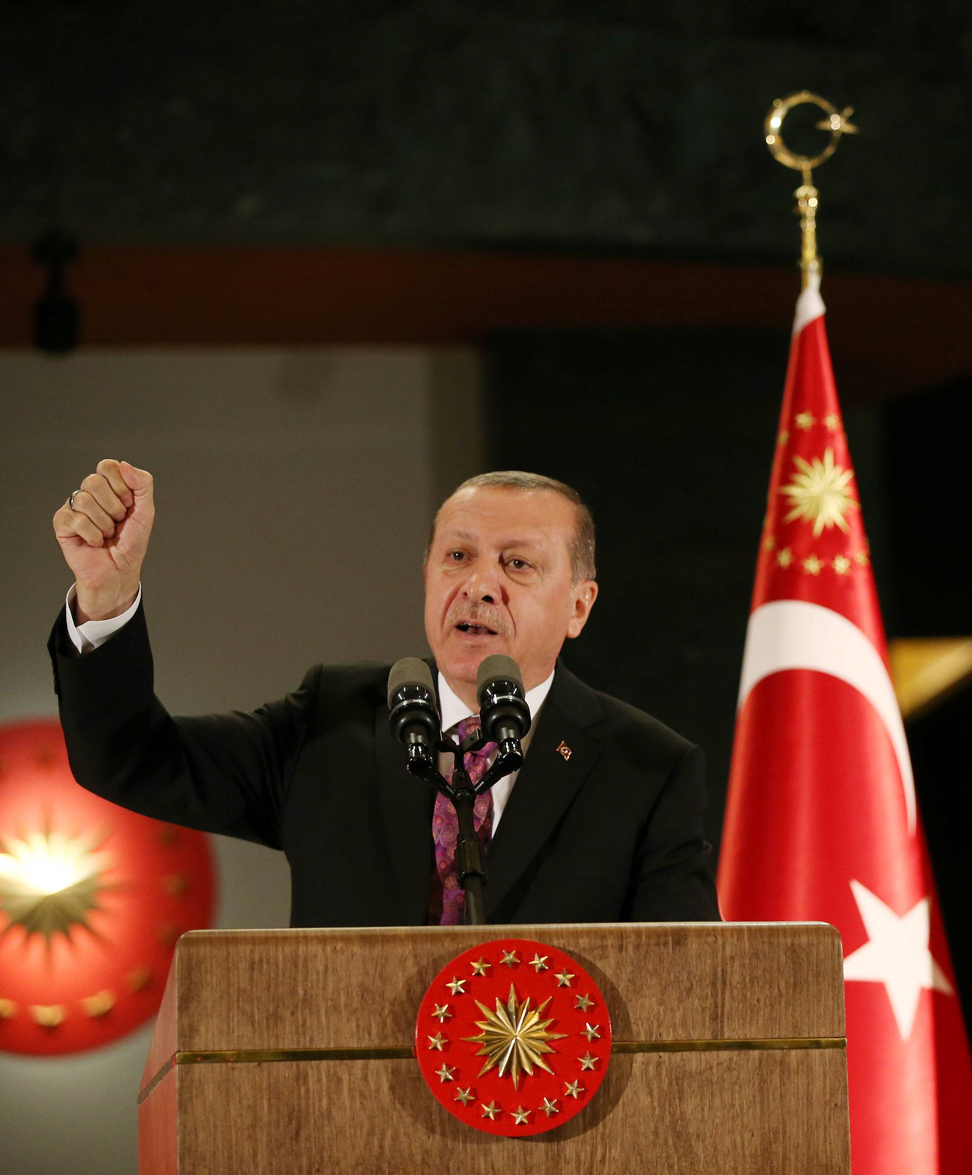 Turkish President Erdogan makes a speech during a fast-breaking iftar dinner at the Presidential Palace in Ankara
