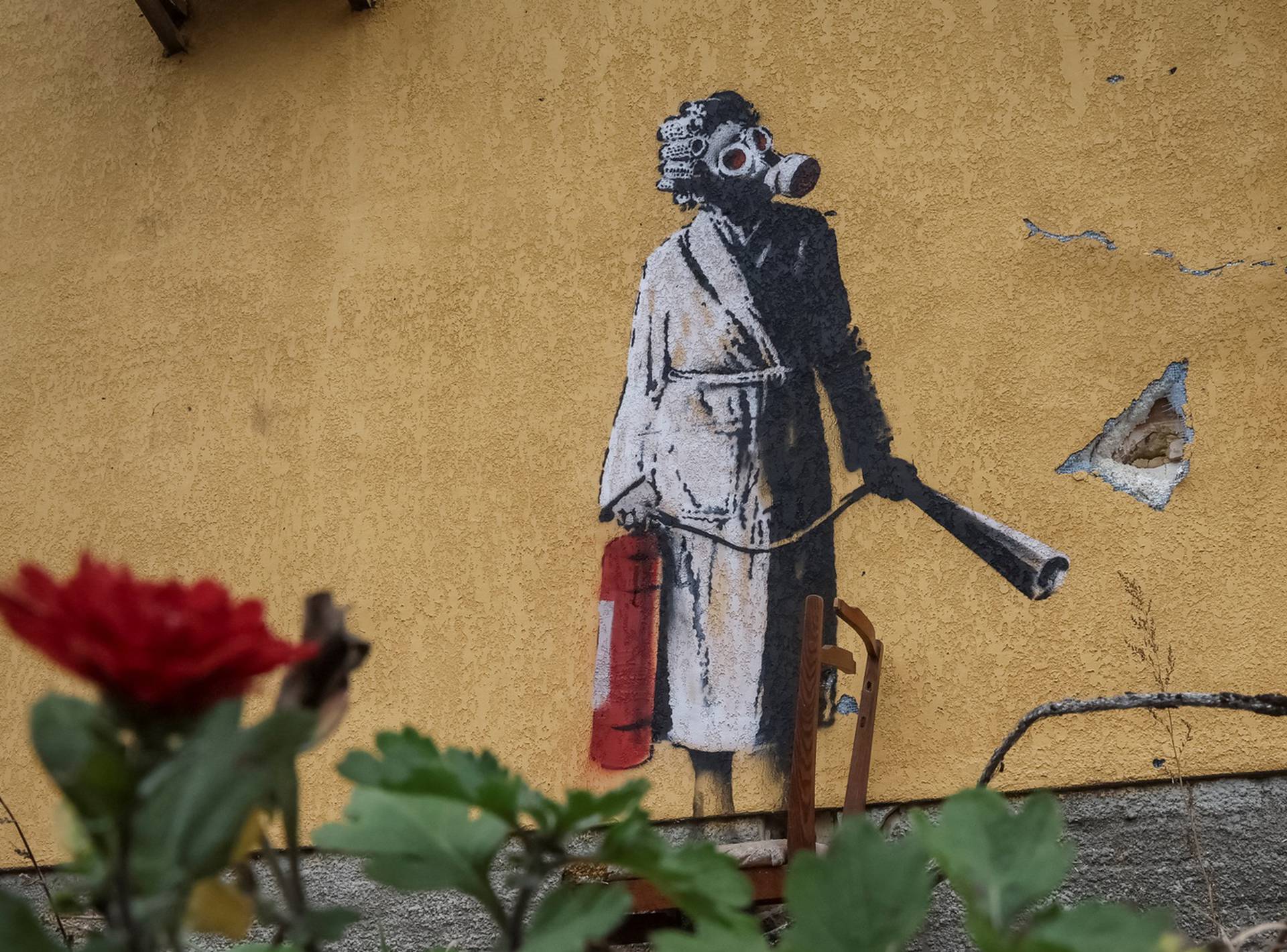 World-renowned graffiti artist Banksy unveiled a work in the Ukrainian town of Hostomel