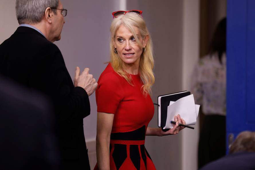 Conway speaks with reporters after the daily press briefing at the White House in Washington