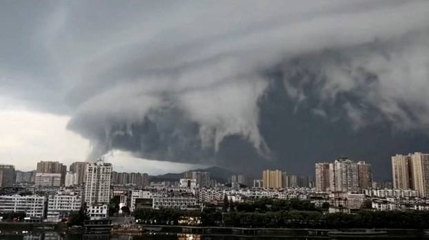 Dark cloud approaches the city of Zhuhai as Typhoon Wipha makes landfall