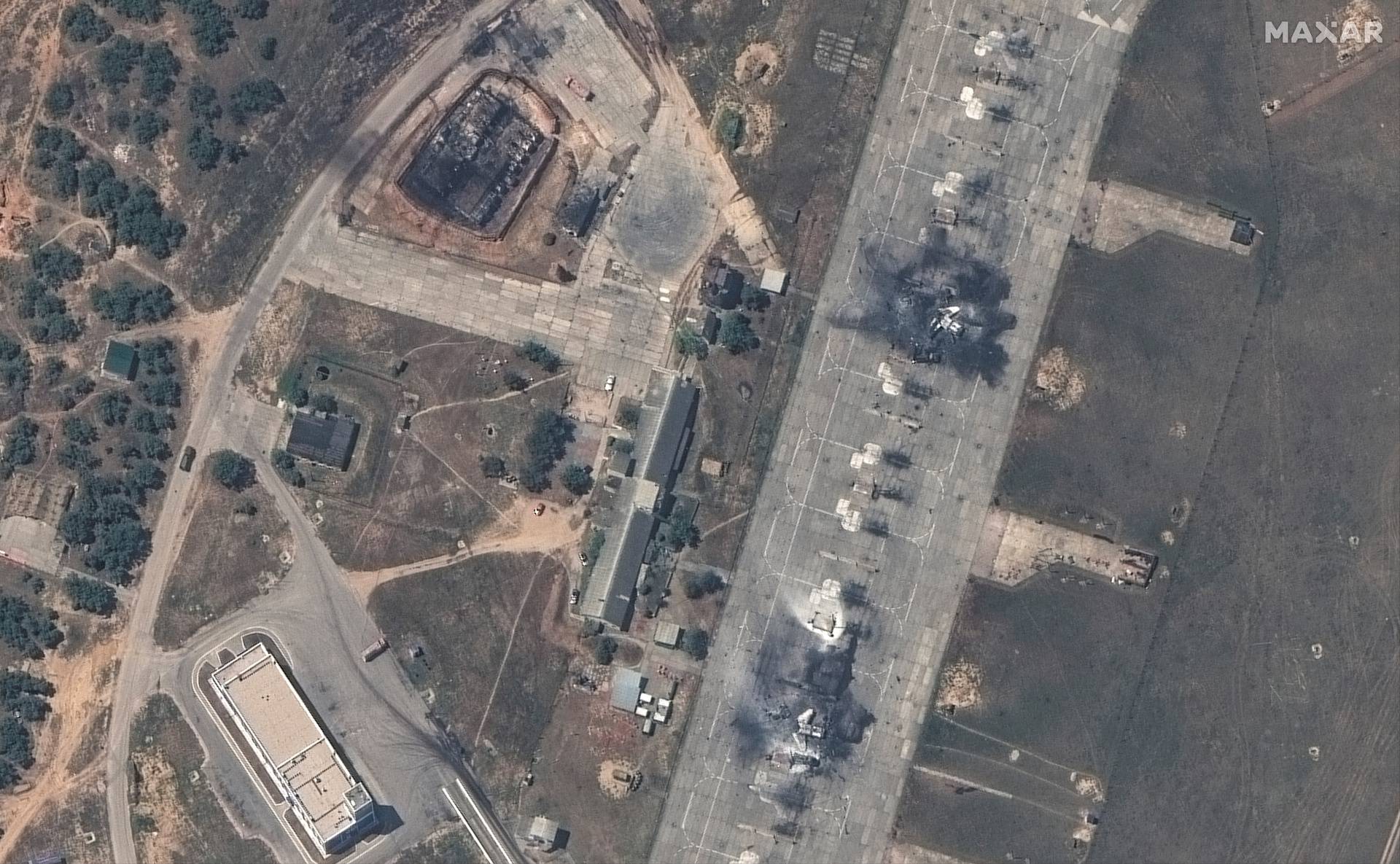 A satellite image of destroyed MiG31 fighter aircraft and fuel storage facility following an attack at Belbek Airbase, amid Russia's attack on Ukraine, in Crimea