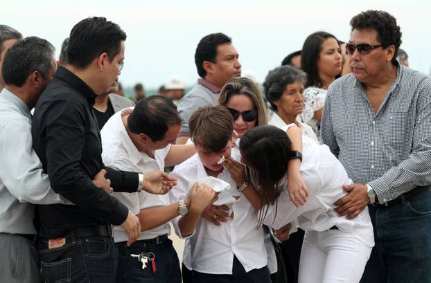 Relatives of Sisy Arias, who died when the plane carrying Brazilian soccer team Chapecoense crashed in Colombia, react at Viru Viru airport in Santa Cruz