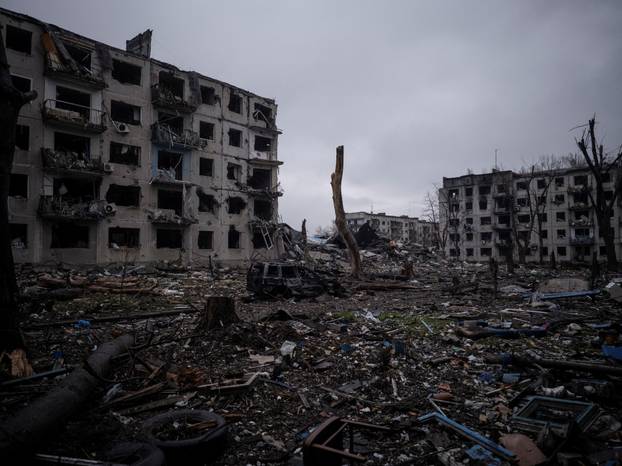 Debris lay on a backyard of apartment buildings damaged by Russian military strikes in the frontline town of Kostiantynivka