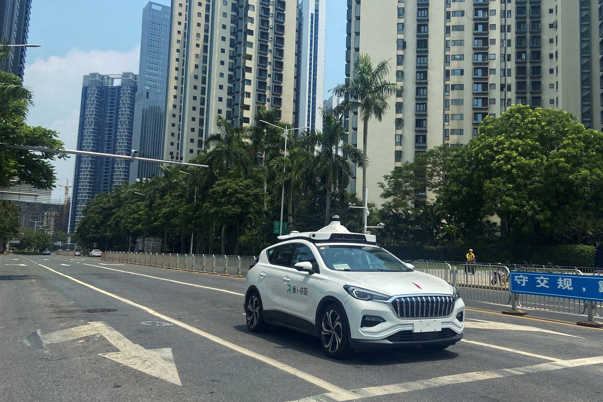 Car of Baidu's autonomous ride-hailing service platform Apollo Go on a street in Shenzhen