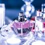 Perfume bottle and vintage fragrance on glamour vanity table at 
