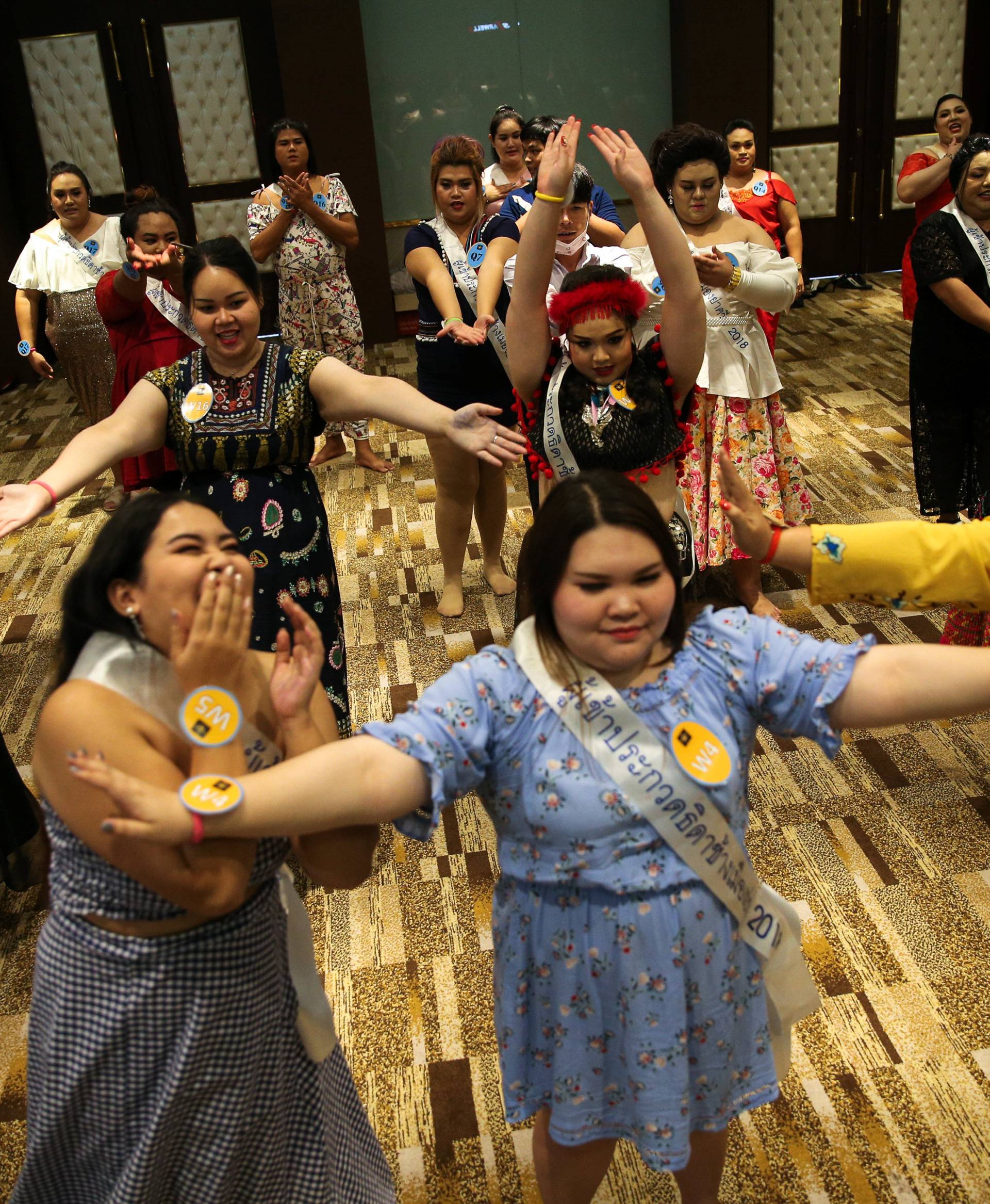 Participants of the Miss Jumbo beauty contest attend a practice session at a hotel in Nakhon Ratchasima