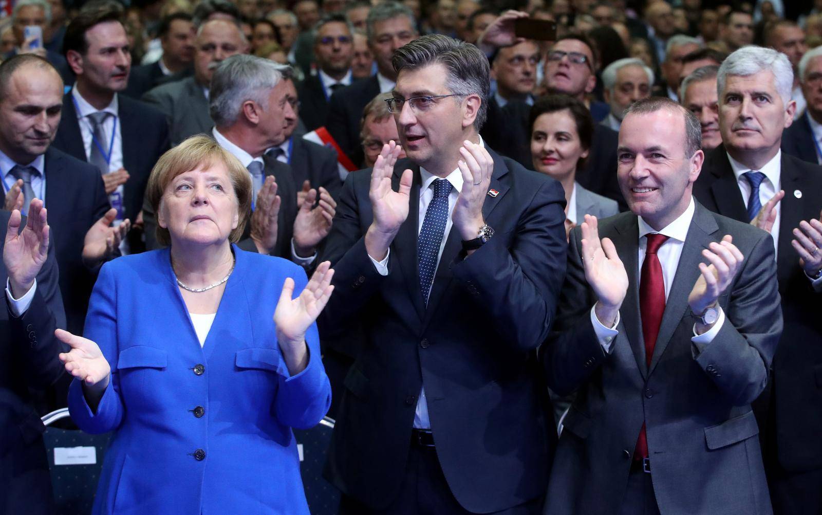 Croatia's Prime Minister Andrej Plenkovic, German Chancellor Angela Merkel and Manfred Weber of the European People's Party during EPP and the Croatian Democratic Union's campaign rally for the European Parliament elections in Zagreb