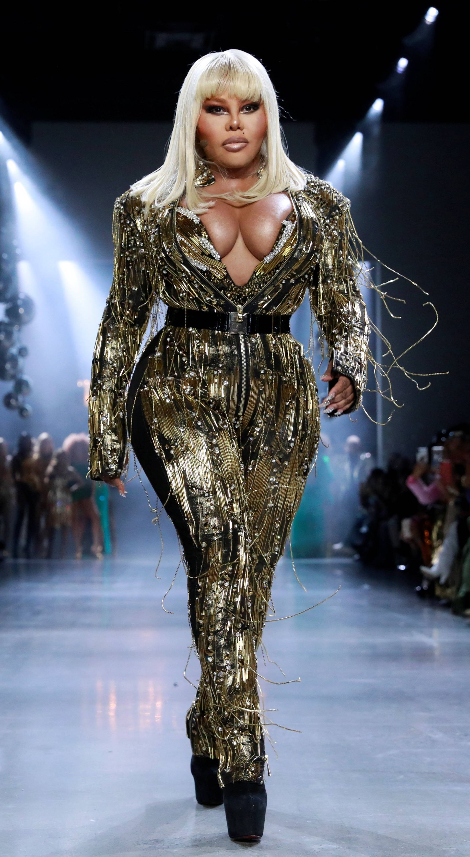 Lil' Kim performs as she presents a creation from The Blonds Autumn/Winter 2019 collection during New York Fashion Week in New York