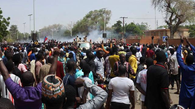 Pro-junta protesters gather outside the French Embassy in Niamey