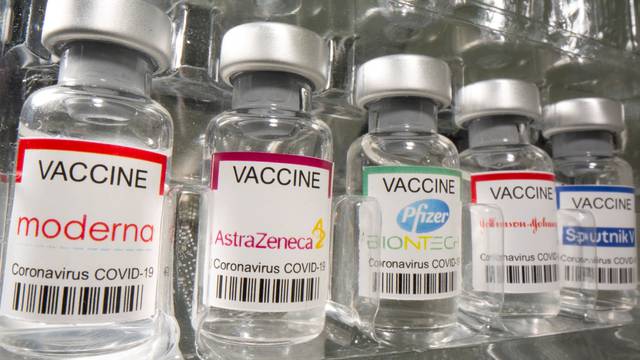 Vials labelled "Moderna, AstraZeneca, Pfizer - Biontech, Johnson&Johnson, Sputnik V coronavirus disease (COVID-19) vaccine" are seen in this illustration picture