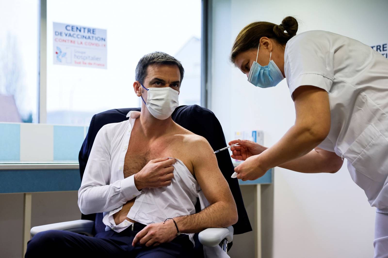 French Health Minister Veran receives a dose of the AstraZeneca-Oxford COVID-19 vaccine, in Melun