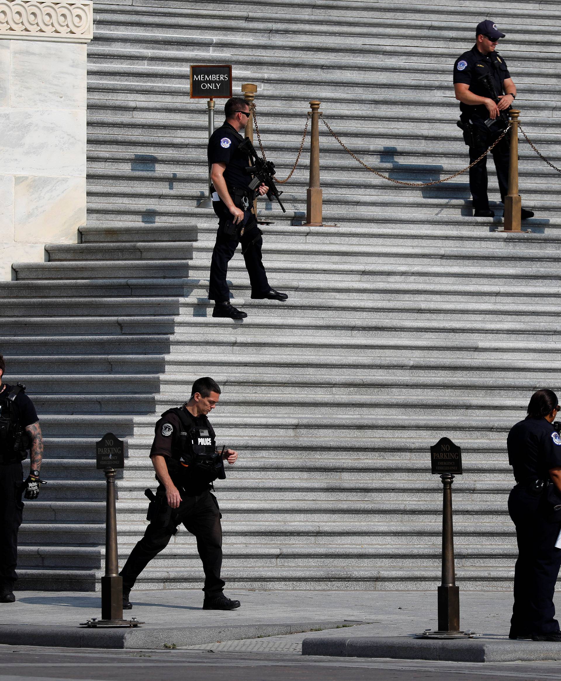 U.S. Capitol Police keep watch on Capitol Hill following a shooting in nearby Alexandria, in Washington