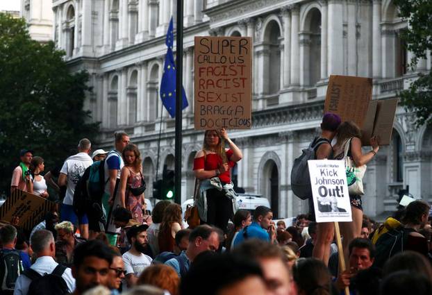 People demonstrate against newly appointed British Prime Minister Boris Johnson outside Downing Street in London