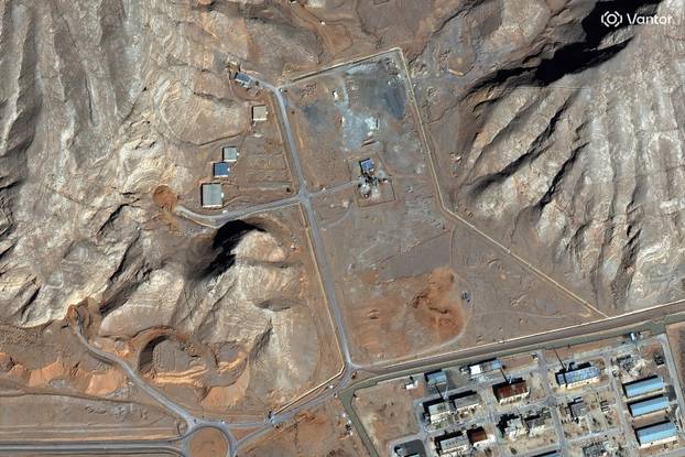 A satellite image shows tunnel entrances covered with soil at Isfahan nuclear complex