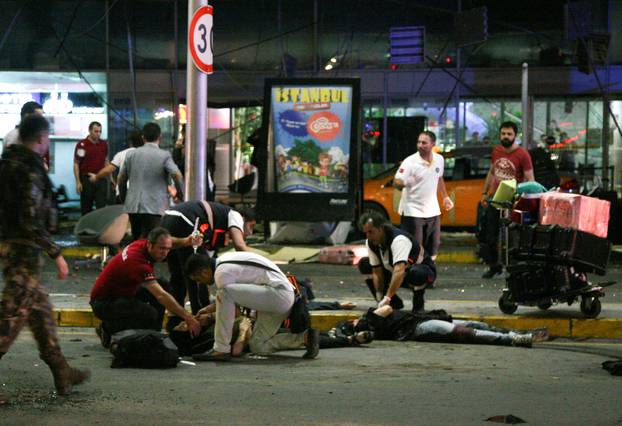 Paramedics attend to casualties injured outside Turkey