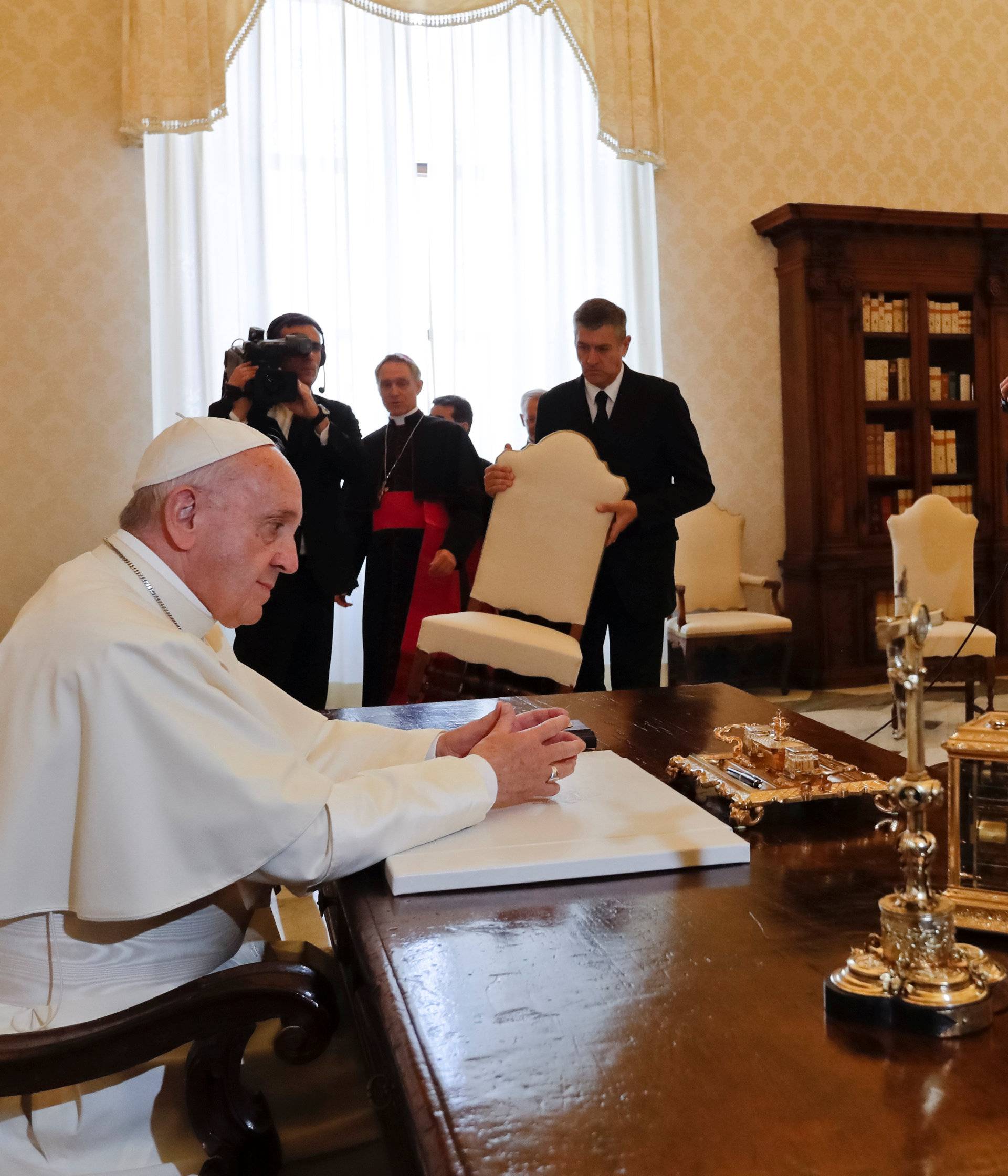 Pope Francis meets U.S. President Donald Trump during a private audience at the Vatican