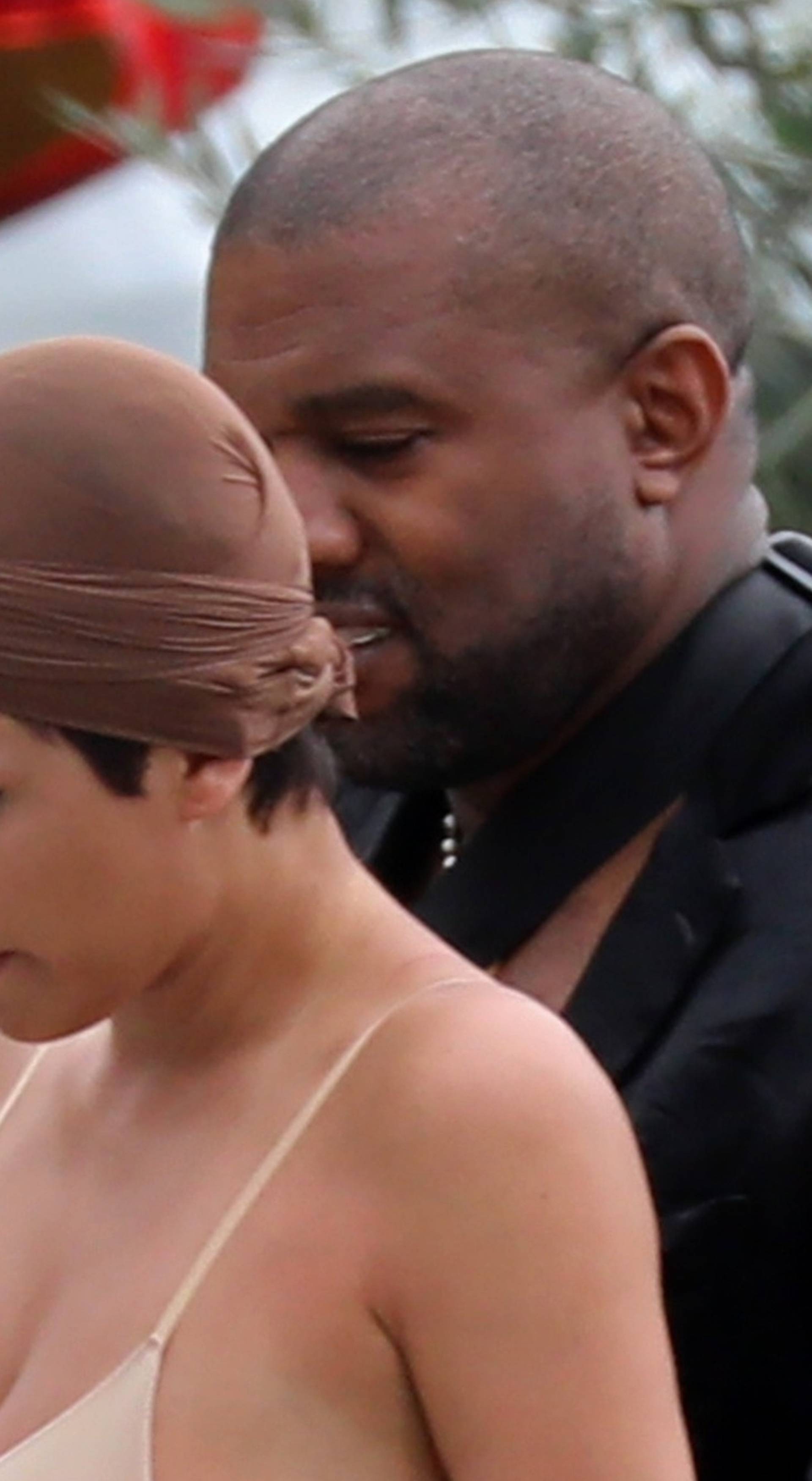*PREMIUM-EXCLUSIVE* *MUST CALL FOR PRICING* Controversial rapper Kanye West is seen with his wife Bianca Censori who rocks a see-through outfit while out in Tuscany.