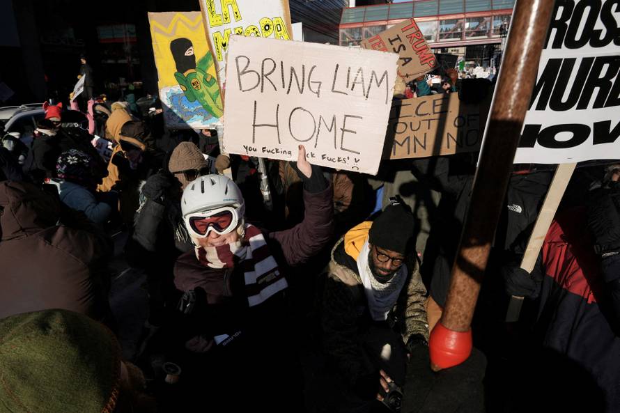 People protest U.S. President Donald Trump's deployment of thousands of immigration enforcement officers on the streets of Minneapolis