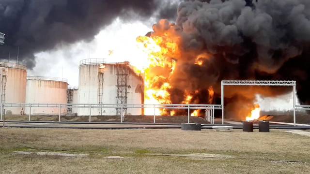 A still image shows a fuel depot on fire in Belgorod